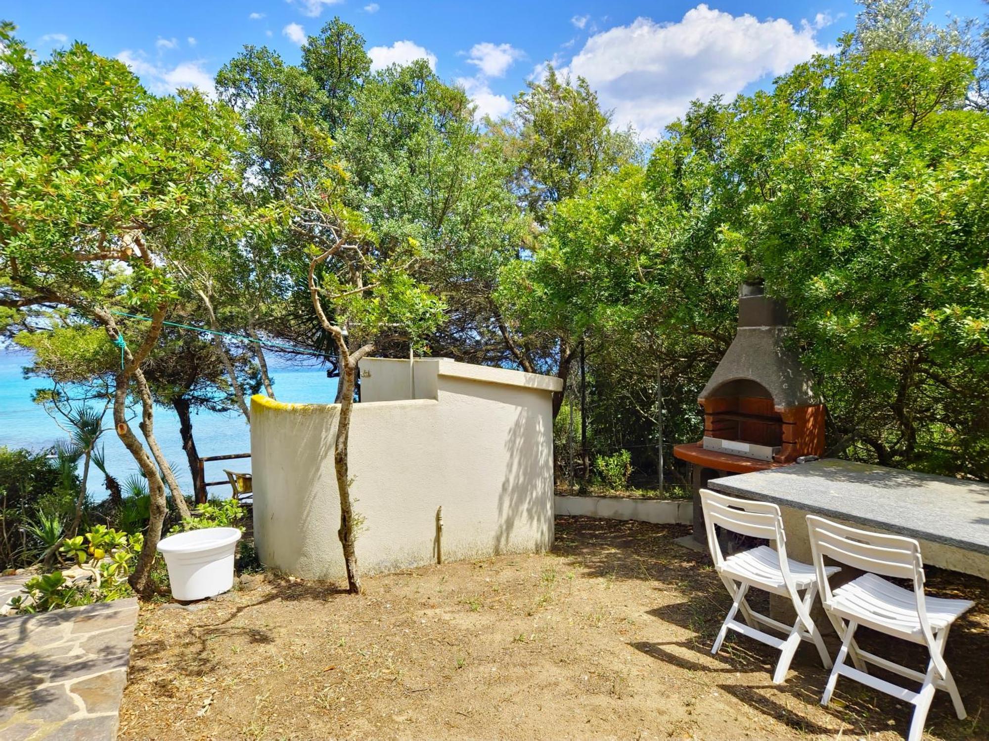 Villa Papiyon - Accesso Privato Alla Spiaggia Cala Liberotto Bagian luar foto